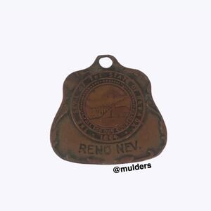 Vintage Reno Nevada Metal Pendant Tag